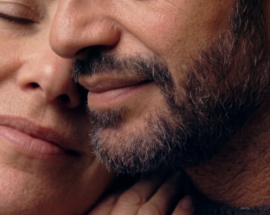 A man embracing a woman